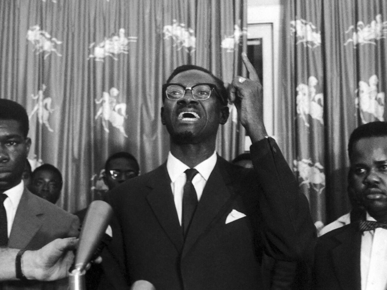 FILE – In this Sept. 10, 1960 file photo Patrice Lumumba speaks at the Senate meeting opposing him to Justin Bomboko in Leopoldville, Congo. A team of Belgian lawyers said Monday June 21. 2010 it is asking prosecutors to bring war crimes charges against officials allegedly involved in the assassination of Patrice Lumumba Congo&rsquo;s first democratically elected prime minister 50 years ago. (AP Photo/H. Babout, File)