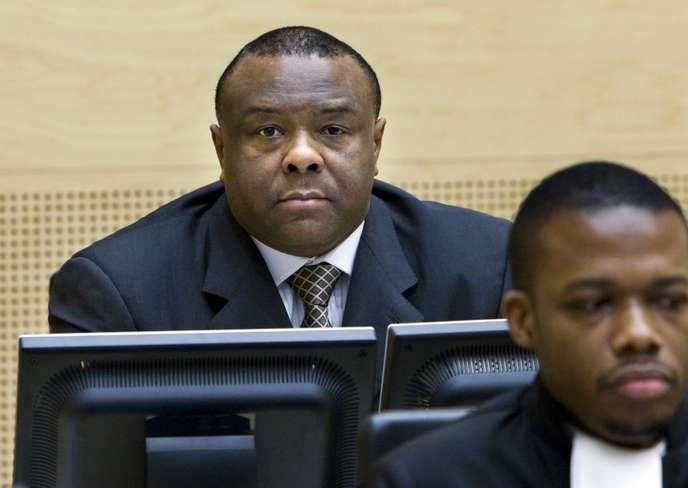 (FILES) In this file photo taken on December 2, 2009 former Congolese rebel warlord and Democratic Republic of Congo Vice President Jean-Pierre Bemba attends a hearing at the International Criminal Court in the Hague. International judges will on June 8, 2018 hand down a verdict in the appeal of disgraced former Congolese vice-president Jean-Pierre Bemba, fighting his conviction for war crimes and an 18-year jail term. Bemba, 55, appealed after judges at the International Criminal Court (ICC) unanimously found him guilty in June 2016 on five charges of war crimes and crimes against humanity in the Central African Republic (CAR). / AFP / ANP / ED OUDENAARDEN
