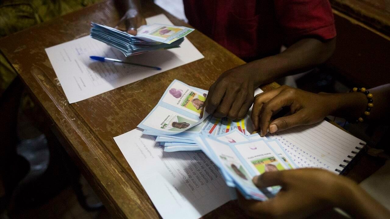 Electoral officials count ballot papers at the end of the presidential second-round election in Bamako, Mali, Sunday, Aug 12, 2018. Malians are voting Sunday in a second round presidential election to determine if incumbent Ibrahim Boubacar Keita will remain in office as insecurity has risen in this sprawling West African nation. He faces off against opposition leader Soumaila Cisse. (AP Photo/Annie Risemberg)