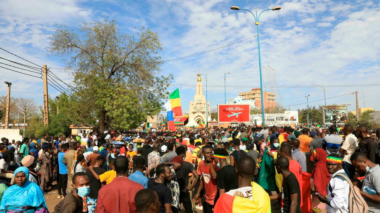 Thousands join a government-sponsored rally in Mali’s capital Bamako Friday Jan. 14, 2021 to protest new regional economic sanctions and growing pressure from former coloniser France, after Mali’s military ruler pushed back promised elections by four years. (AP Photo/Harandane Dicko)