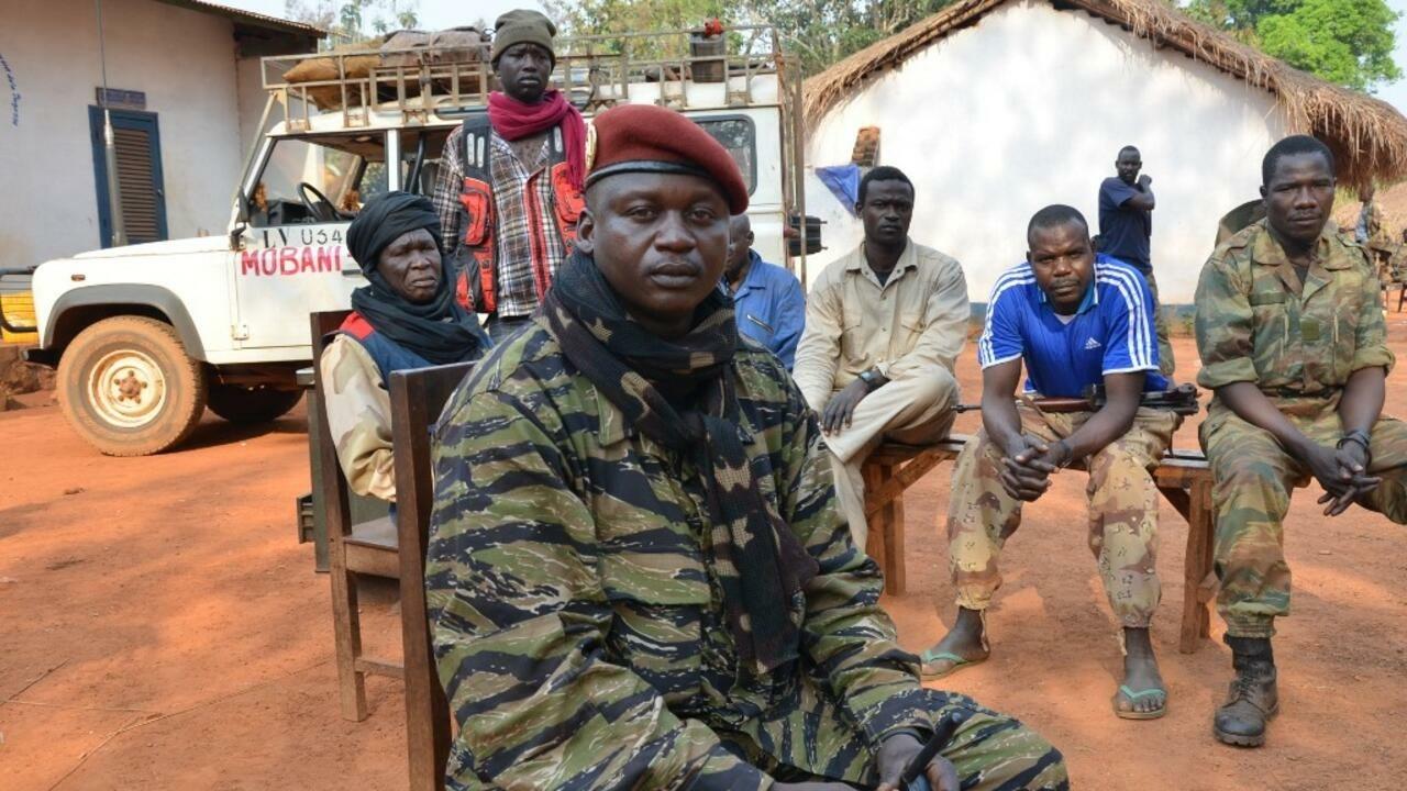 Seleka spokesman and military chief rebel, Colonel Christian Djouma Narkoyo, poses on January 18, 2013 in Grimari north of Damara, 75 kms from the capital Bangui. Opposition lawyer Nicolas Tiangaye was on January 17 officially appointed prime minister of the Central African Republic’s new national unity government, President Francois Bozize said after a ceremony in the capital Bangui. The announcement came in line with a peace deal struck between the ruling party, the Seleka rebels and opposition on January 13. AFP PHOTO / PATRICK FORT (Photo by PATRICK FORT / AFP)