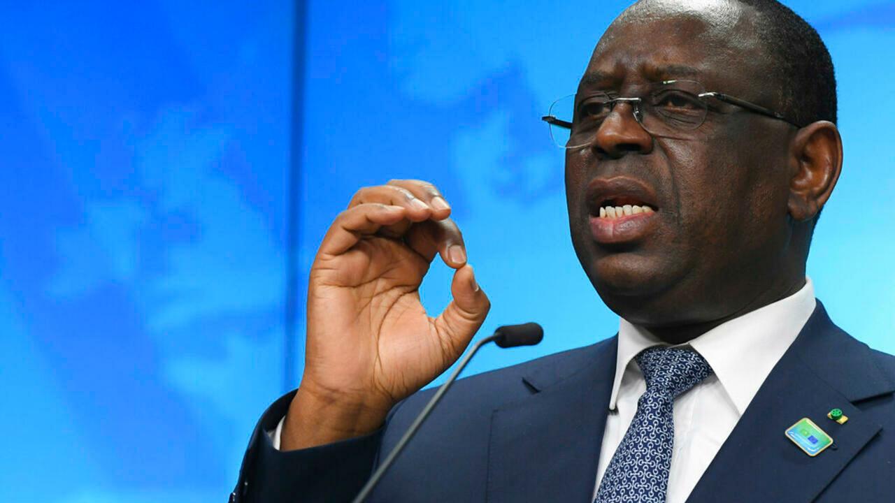 Senegal’s President Macky Sall speaks during a media conference at the conclusion of an EU Africa summit in Brussels, Friday, Feb. 18, 2022. European Union leaders on Thursday lauded the bloc’s vaccine cooperation with Africa in the fight against the coronavirus, but there was no sign they would move toward a temporary lifting of intellectual property rights protection for COVID-19 shots. (John Thys, Pool Photo via AP)