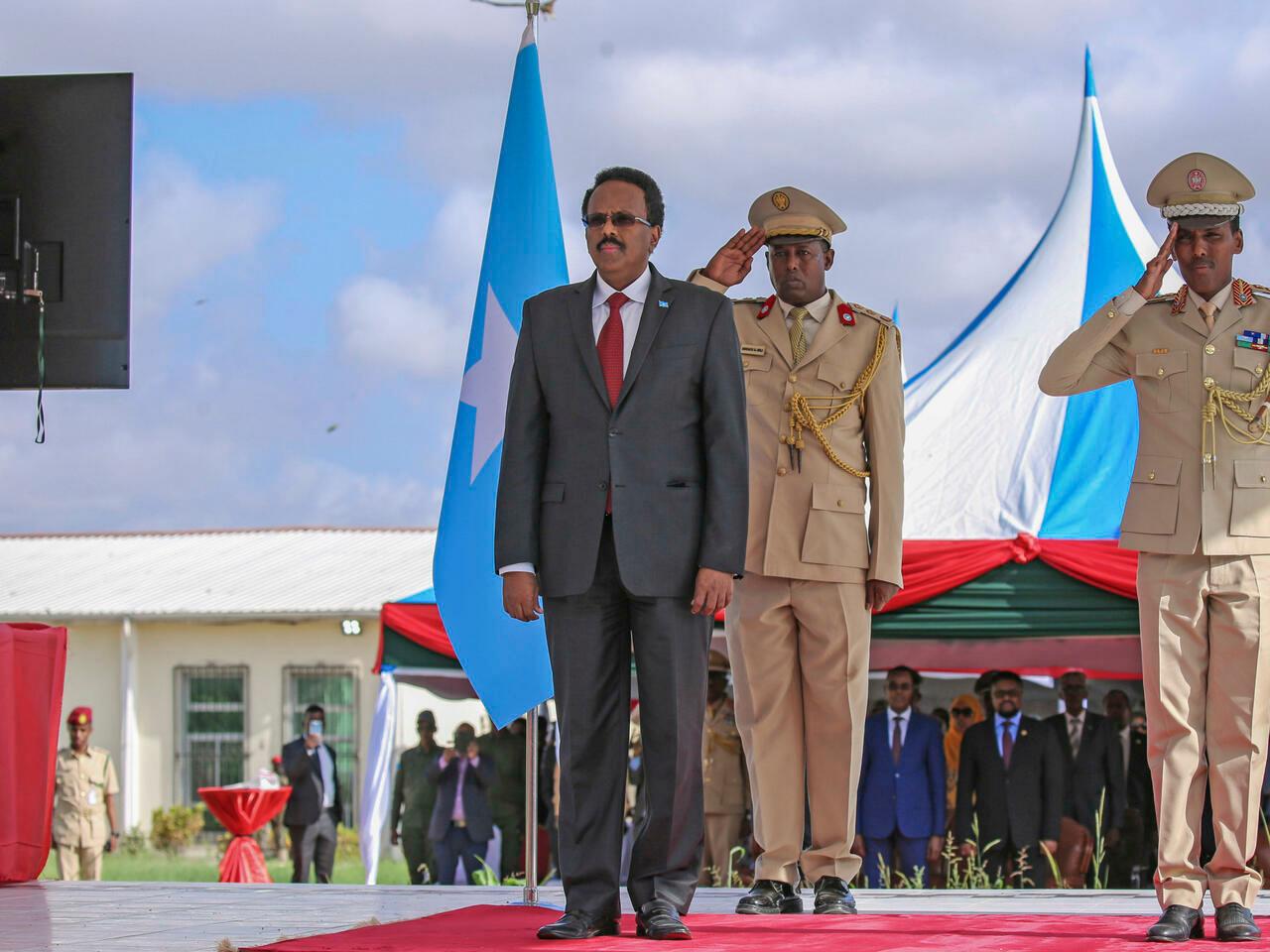 President Mohamed Abdullahi Mohamed, center, attends a military parade at the ministry of defense in Mogadishu, Somalia Tuesday, April 12, 2022. The Somali Armed Forces marked the 62nd anniversary of their founding on Tuesday. (AP Photo/Farah Abdi Warsameh)