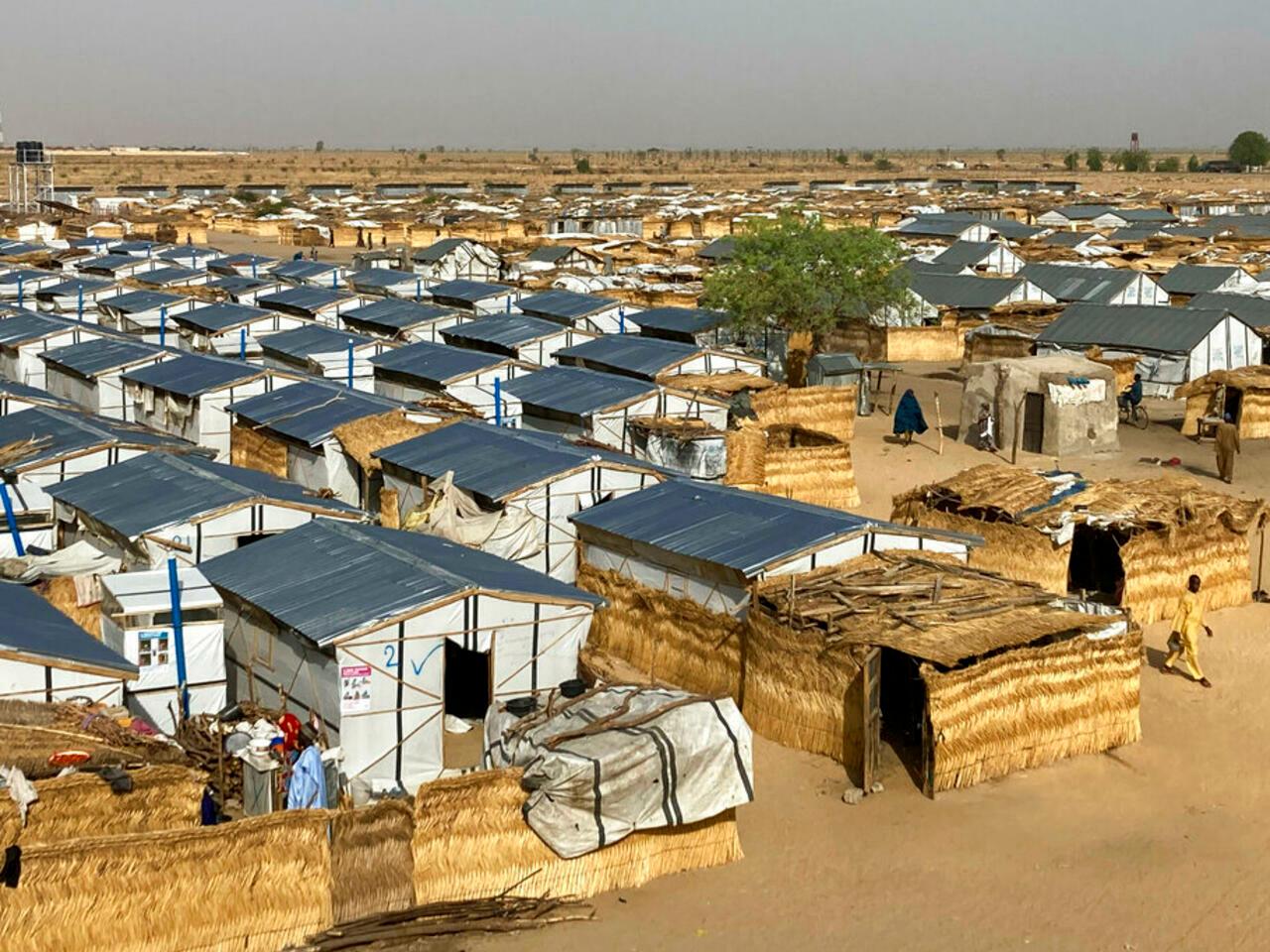 An aerial view of Jere Camp where people displaced by Islamist extremists are residing, including Iza Ali, in Maiduguri, Nigeria, Monday, May 2, 2022. Aid agencies are warning that acute malnutrition is on the rise in northeast Nigeria. The development comes after a year of poor food production in the country and as humanitarian aid is being diverted to the crisis in Ukraine. The U.N. children’s agency says acute malnutrition has soared from affecting 1.4 million children to 1.7 million over the last year. (AP Photo/Chinedu Asadu)