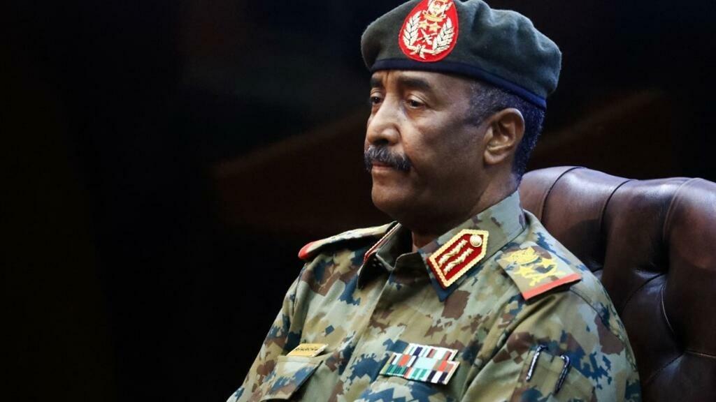 Sudan’s top army general Abdel Fattah al-Burhan holds a press conference at the General Command of the Armed Forces in Khartoum on October 26, 2021. – Angry Sudanese stood their ground in street protests against a coup, as international condemnation of the military’s takeover poured in ahead of a UN Security Council meeting. (Photo by ASHRAF SHAZLY / AFP)