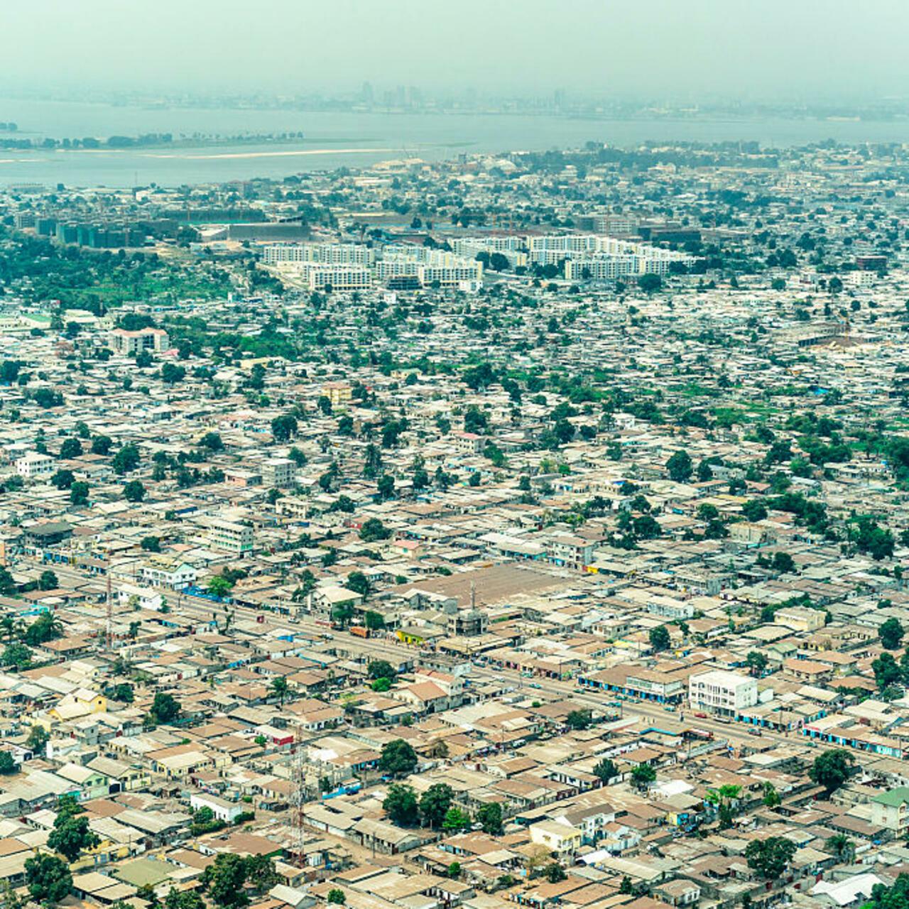 Aerial view of Brazzaville with the Congo River and Kinshasa, Capital of Democratic Republic of the Congo in the background. (Photo by: Education Images/Universal Images Group via Getty Images)