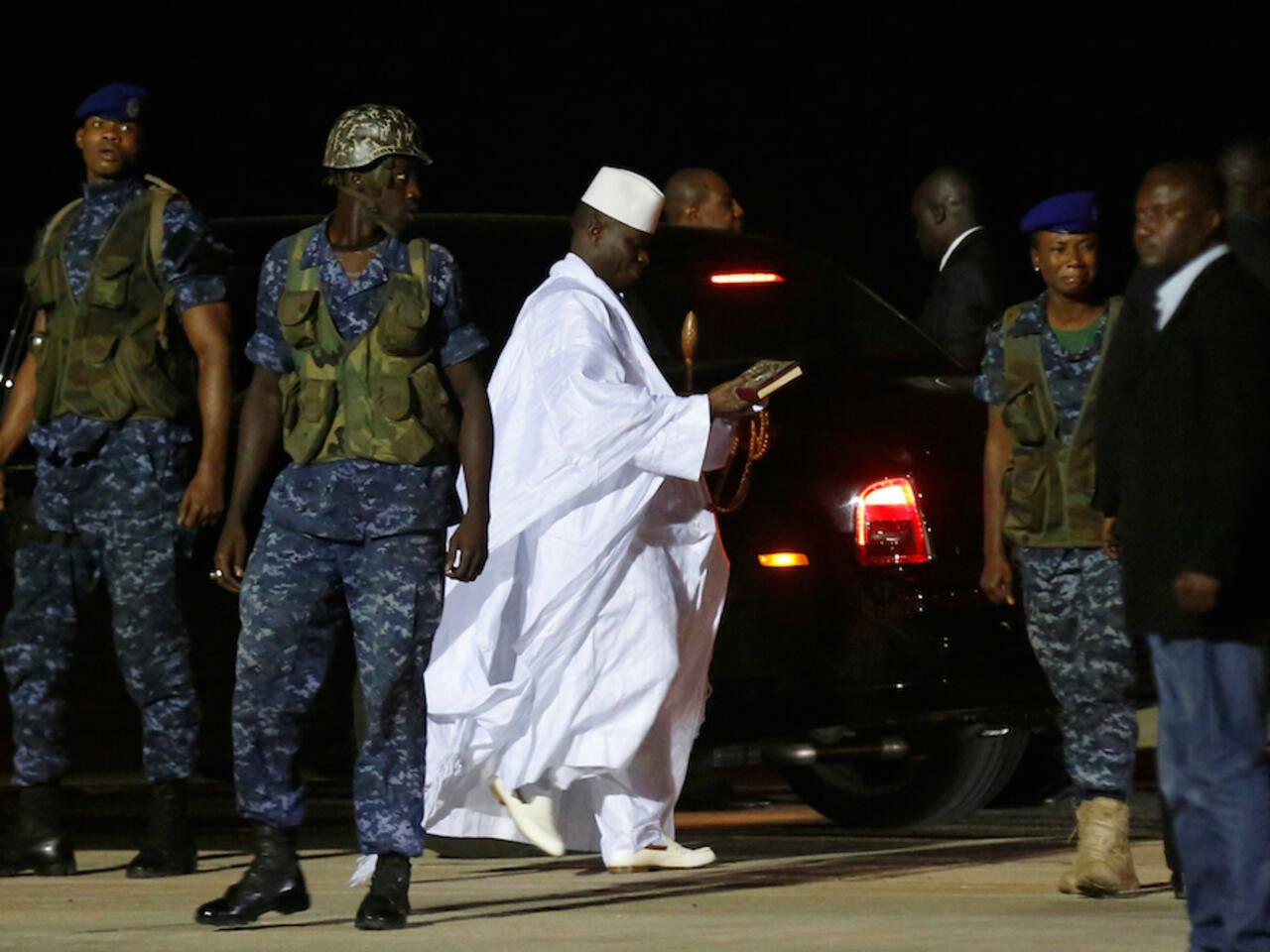 A security officer of former Gambian President Yahya Jammeh cries as he arrives at the airport before flying into exile from Gambia, January 21, 2017. REUTERS/Thierry Gouegnon